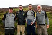 1 August 2022; Neil McManus of Antrim with, from left, National Poc Fada Committee Cathaoirleach Tom Ryan, Ard Stiúrthóir of the GAA Tom Ryan and event sponsor Martin Donnelly after the M. Donnelly GAA All-Ireland Poc Fada Finals at Cooley Mountains in Louth. Photo by Harry Murphy/Sportsfile