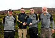 1 August 2022; Mark Fahy of Galway with, from left, National Poc Fada Committee Cathaoirleach Tom Ryan, Ard Stiúrthóir of the GAA Tom Ryan and event sponsor Martin Donnelly after the M. Donnelly GAA All-Ireland Poc Fada Finals at Cooley Mountains in Louth. Photo by Harry Murphy/Sportsfile