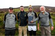 1 August 2022; Brian Treacy of Carlow with, from left, National Poc Fada Committee Cathaoirleach Tom Ryan, Ard Stiúrthóir of the GAA Tom Ryan and event sponsor Martin Donnelly after the M. Donnelly GAA All-Ireland Poc Fada Finals at Cooley Mountains in Louth. Photo by Harry Murphy/Sportsfile
