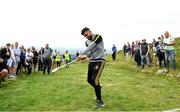 1 August 2022; Special guest and Leitrim hurler Zak Moradi takes the ceremonial first poc off during the M. Donnelly GAA All-Ireland Poc Fada Finals at Cooley Mountains in Louth. Photo by Harry Murphy/Sportsfile