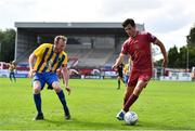 31 July 2022; Oisín O'Reilly of Galway United and Karl Russell of Bluebell United during the Extra.ie FAI Cup First Round match between Bluebell United and Galway United at Tolka Park in Dublin. Photo by Ben McShane/Sportsfile