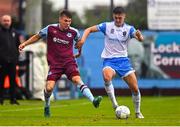 1 August 2022; Dayle Rooney of Drogheda United in action against Dylan Duffy of UCD during the SSE Airtricity League Premier Division match between Drogheda United and UCD at Head in the Game Park in Drogheda, Louth. Photo by Ben McShane/Sportsfile
