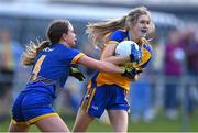 3 August 2022; Edel McNamara of Clare in action against Alana Carroll of Wicklow during the ZuCar All-Ireland Ladies Football Minor ‘C’ Championship Final match between Clare and Wicklow at Kinnegad GAA club in Kinnegad, Westmeath. Photo by Piaras Ó Mídheach/Sportsfile