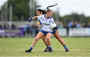 3 August 2022; Tara Renaghan of Monaghan in action against Elle Lynn of Longford during the ZuCar All-Ireland Ladies Football Minor B Championship Final match between Monaghan and Longford at Donaghmore Ashbourne GAA club in Ashbourne, Meath. Photo by David Fitzgerald/Sportsfile