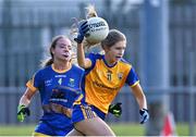 3 August 2022; Edel McNamara of Clare in action against Alana Carroll of Wicklow during the ZuCar All-Ireland Ladies Football Minor ‘C’ Championship Final match between Clare and Wicklow at Kinnegad GAA club in Kinnegad, Westmeath. Photo by Piaras Ó Mídheach/Sportsfile