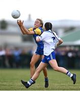 3 August 2022; Megan Glennon of Longford in action against Róisín Lennon of Monaghan during the ZuCar All-Ireland Ladies Football Minor B Championship Final match between Monaghan and Longford at Donaghmore Ashbourne GAA club in Ashbourne, Meath. Photo by David Fitzgerald/Sportsfile