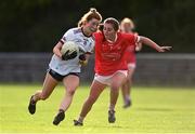 3 August 2022; Marta Banek of Galway in action against Aimee Corcoran of Cork during the ZuCar All-Ireland Ladies Football Minor ‘A’ Championship Final match between Cork and Galway at MacDonagh Park in Nenagh, Tipperary. Photo by Harry Murphy/Sportsfile