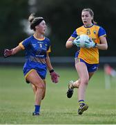 3 August 2022; Aoife Moloney of Clare in action against Eimear O'Sullivan of Wicklow during the ZuCar All-Ireland Ladies Football Minor ‘C’ Championship Final match between Clare and Wicklow at Kinnegad GAA club in Kinnegad, Westmeath. Photo by Piaras Ó Mídheach/Sportsfile