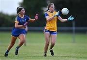 3 August 2022; Aoife Moloney of Clare in action against Eimear O'Sullivan of Wicklow during the ZuCar All-Ireland Ladies Football Minor ‘C’ Championship Final match between Clare and Wicklow at Kinnegad GAA club in Kinnegad, Westmeath. Photo by Piaras Ó Mídheach/Sportsfile