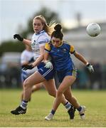 3 August 2022; Grace Kenny of Longford in action against Eabha Sherry of Monaghan during the ZuCar All-Ireland Ladies Football Minor B Championship Final match between Monaghan and Longford at Donaghmore Ashbourne GAA club in Ashbourne, Meath. Photo by David Fitzgerald/Sportsfile