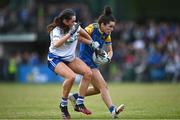 3 August 2022; Grace Kenny of Longford in action against Holly McQuaid of Monaghan during the ZuCar All-Ireland Ladies Football Minor B Championship Final match between Monaghan and Longford at Donaghmore Ashbourne GAA club in Ashbourne, Meath. Photo by David Fitzgerald/Sportsfile