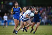 3 August 2022; Laura Grimes of Monaghan in action against Caoimhe McCormack of Longford during the ZuCar All-Ireland Ladies Football Minor B Championship Final match between Monaghan and Longford at Donaghmore Ashbourne GAA club in Ashbourne, Meath. Photo by David Fitzgerald/Sportsfile