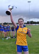 3 August 2022; Clare captain Emer Hynes lifts the cup after her side's victory in the ZuCar All-Ireland Ladies Football Minor ‘C’ Championship Final match between Clare and Wicklow at Kinnegad GAA club in Kinnegad, Westmeath. Photo by Piaras Ó Mídheach/Sportsfile