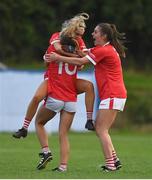 3 August 2022; Cork players, from left, Abigail Ring, Rachel Leahy and Aimee Corcoran celebrate after their side's victory in the ZuCar All-Ireland Ladies Football Minor ‘A’ Championship Final match between Cork and Galway at MacDonagh Park in Nenagh, Tipperary. Photo by Harry Murphy/Sportsfile