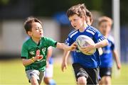 4 August 2022; Michael Martin, right, and Fionn Burns during the Bank of Ireland Leinster Rugby Summer Camp at St Mary's College RFC in Dublin. Photo by Ben McShane/Sportsfile