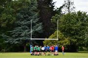 4 August 2022; Participants huddle during the Bank of Ireland Leinster Rugby School of Excellence at The King's Hospital School in Dublin. Photo by Ben McShane/Sportsfile