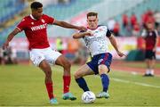 4 August 2022; Anto Breslin of St Patrick's Athletic in action against Mauricio Garcez of CSKA Sofia during the UEFA Europa Conference League third qualifying round first leg match between CSKA Sofia and St Patrick's Athletic at Stadion Balgarska Armia in Sofia, Bulgaria. Photo by Yulian Todorov/Sportsfile