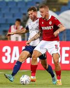 4 August 2022; Thibaut Vion of CSKA Sofia in action against Anto Breslin of St Patrick's Athletic during the UEFA Europa Conference League third qualifying round first leg match between CSKA Sofia and St Patrick's Athletic at Stadion Balgarska Armia in Sofia, Bulgaria. Photo by Yulian Todorov/Sportsfile