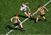 31 July 2022; Orlagh Lally of Meath in action against Kerry players, Louise Ní Mhuircheartaigh, 15, and Paris McCarthy during the TG4 All-Ireland Ladies Football Senior Championship Final match between Kerry and Meath at Croke Park in Dublin. Photo by Piaras Ó Mídheach/Sportsfile