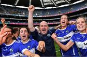 31 July 2022; Laois manager Donie Brennan celebrates with his players after their side's victory in the TG4 All-Ireland Ladies Football Intermediate Championship Final match between Laois and Wexford at Croke Park in Dublin. Photo by Piaras Ó Mídheach/Sportsfile