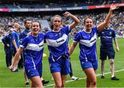 31 July 2022; Laois players, from left, Ellen Healy, Mo Nerney and Anna Healy after their side's victory in the TG4 All-Ireland Ladies Football Intermediate Championship Final match between Laois and Wexford at Croke Park in Dublin. Photo by Piaras Ó Mídheach/Sportsfile