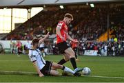 5 August 2022; Cameron McJannet of Derry City is tackled by Joe Adams of Dundalk during the SSE Airtricity League Premier Division match between Dundalk and Derry City at Oriel Park in Dundalk, Louth. Photo by Ben McShane/Sportsfile