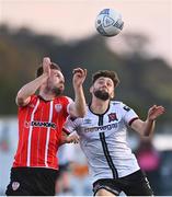 5 August 2022; Cameron Dummigan of Derry City in action against Joe Adams of Dundalk during the SSE Airtricity League Premier Division match between Dundalk and Derry City at Oriel Park in Dundalk, Louth. Photo by Ben McShane/Sportsfile