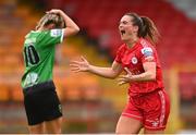 6 August 2022; Jemma Quinn of Shelbourne celebrates after scoring her side's first goal as Stephanie Roche of Peamount United reacts during the 2022 EVOKE.ie FAI Women's Cup Quarter-Final match between Shelbourne and Peamount United at Tolka Park in Dublin. Photo by Ben McShane/Sportsfile