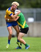 6 August 2022; James Doran of Na Fianna in action against Conor Baxter of Thomas Davis during the Dublin County Senior Club Football Championship Group 3 match between Thomas Davis and Na Fianna at Parnell Park in Dublin. Photo by Piaras Ó Mídheach/Sportsfile