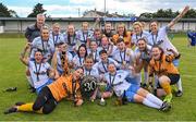 6 August 2022; Eastern Women's Football League players and management celebrate with the trophy after their side's victory in the FAI Women's Angela Hearst InterLeague Cup Final match between Wexford & District Women's League and Eastern Women's Football League at Arklow Town FC, in Wicklow. Photo by Seb Daly/Sportsfile