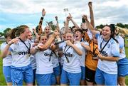 6 August 2022; Eastern Women's Football League players celebrate with the trophy after their side's victory in the FAI Women's Angela Hearst InterLeague Cup Final match between Wexford & District Women's League and Eastern Women's Football League at Arklow Town FC, in Wicklow. Photo by Seb Daly/Sportsfile