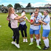 6 August 2022; Eastern Women's Football League captain Laura Chambers, centre, celebrates her 30th birthday with teammates and supporters after their side's victory in the FAI Women's Angela Hearst InterLeague Cup Final match between Wexford & District Women's League and Eastern Women's Football League at Arklow Town FC, in Wicklow. Photo by Seb Daly/Sportsfile