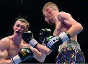 6 August 2022; Ruadhan Farrell, right, and Colm Murphy during their BUI Celtic featherweight title bout at SSE Arena in Belfast. Photo by Ramsey Cardy/Sportsfile