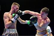 6 August 2022; Ruadhan Farrell, left, and Colm Murphy during their BUI Celtic featherweight title bout at SSE Arena in Belfast. Photo by Ramsey Cardy/Sportsfile