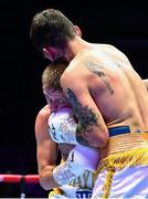 6 August 2022; Kurt Walker, left, and Marcos Gabriel Martinez during their featherweight bout at SSE Arena in Belfast. Photo by Ramsey Cardy/Sportsfile