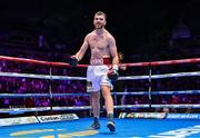 6 August 2022; Kieran Molloy celebrates defeating Evgenii Vazem during their super-welterweight bout at SSE Arena in Belfast. Photo by Ramsey Cardy/Sportsfile