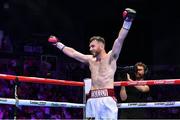 6 August 2022; Kieran Molloy celebrates defeating Evgenii Vazem during their super-welterweight bout at SSE Arena in Belfast. Photo by Ramsey Cardy/Sportsfile