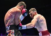 6 August 2022; Kieran Molloy, right, and Evgenii Vazem during their super-welterweight bout at SSE Arena in Belfast. Photo by Ramsey Cardy/Sportsfile