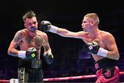 6 August 2022; Tyrone McKenna, left, and Chris Jenkins during their welterweight bout at SSE Arena in Belfast. Photo by Ramsey Cardy/Sportsfile