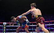 6 August 2022; Michael Conlan, right, and Miguel Marriaga during their featherweight bout at SSE Arena in Belfast. Photo by Ramsey Cardy/Sportsfile