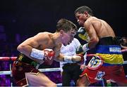 6 August 2022; Michael Conlan, left, and Miguel Marriaga during their featherweight bout at SSE Arena in Belfast. Photo by Ramsey Cardy/Sportsfile