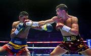 6 August 2022; Michael Conlan, right, and Miguel Marriaga during their featherweight bout at SSE Arena in Belfast. Photo by Ramsey Cardy/Sportsfile