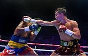 6 August 2022; Michael Conlan, right, and Miguel Marriaga during their featherweight bout at SSE Arena in Belfast. Photo by Ramsey Cardy/Sportsfile