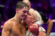 6 August 2022; Michael Conlan, with his mother Teresa, after defeating Miguel Marriaga in their featherweight bout at SSE Arena in Belfast. Photo by Ramsey Cardy/Sportsfile