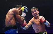 6 August 2022; Michael Conlan, right, and Miguel Marriaga during their featherweight bout at SSE Arena in Belfast. Photo by Ramsey Cardy/Sportsfile
