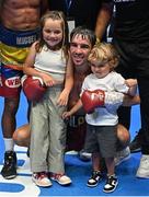 6 August 2022; Michael Conlan, with his children Luisne and Michael Jnr, after defeating Miguel Marriaga in their featherweight bout at SSE Arena in Belfast. Photo by Ramsey Cardy/Sportsfile