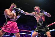 6 August 2022; Tyrone McKenna, right, and Chris Jenkins during their welterweight bout at SSE Arena in Belfast. Photo by Ramsey Cardy/Sportsfile