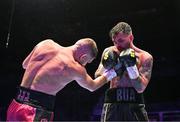 6 August 2022; Tyrone McKenna, right, and Chris Jenkins during their welterweight bout at SSE Arena in Belfast. Photo by Ramsey Cardy/Sportsfile