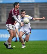6 August 2022; Eoin Keogh of Raheny in action against Dan O'Brien of Kilmacud Crokes during the Dublin County Senior Club Football Championship Group 1 match between Kilmacud Crokes and Raheny at Parnell Park in Dublin. Photo by Piaras Ó Mídheach/Sportsfile