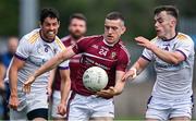 6 August 2022; James O'Kane of Raheny in action against Rory O'Carroll, left, and Dan O'Brien of Kilmacud Crokes during the Dublin County Senior Club Football Championship Group 1 match between Kilmacud Crokes and Raheny at Parnell Park in Dublin. Photo by Piaras Ó Mídheach/Sportsfile